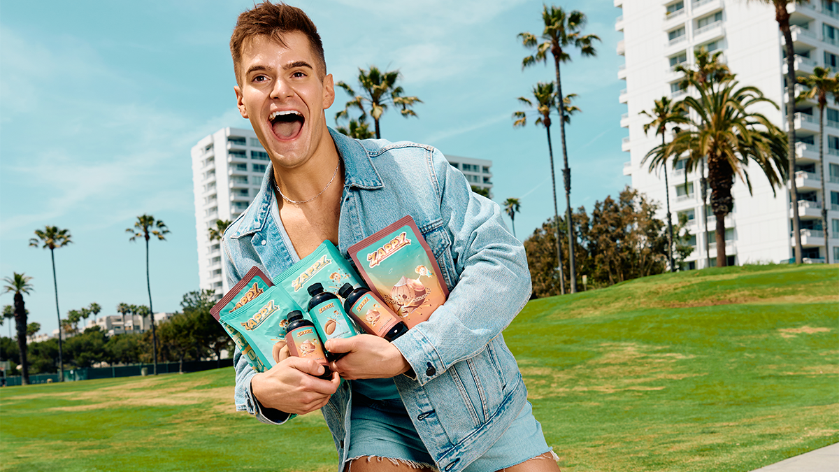 Caleb Marshall Holding a zappy ultimate coffee bundle